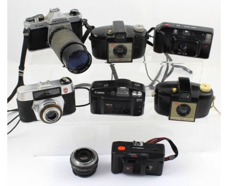 A small collection of camera equipment to include Pentax K1000 with Soligor 80-200mm lens, a Regulette Pronto 35mm camera, a 