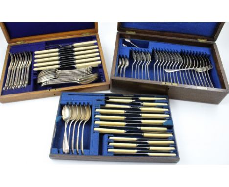 An oak-cased set of Joaquin Suarez plated flatware to include twelve forks, twelve dessert spoons, twelve knives and a meat f