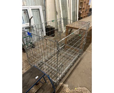 Metal grate caged porters trolley