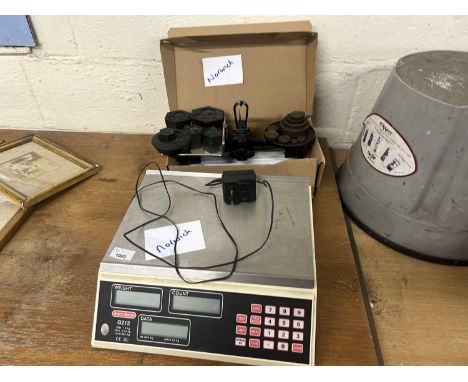 Set of electronic weights together with a vintage set of Avery weights and scales
