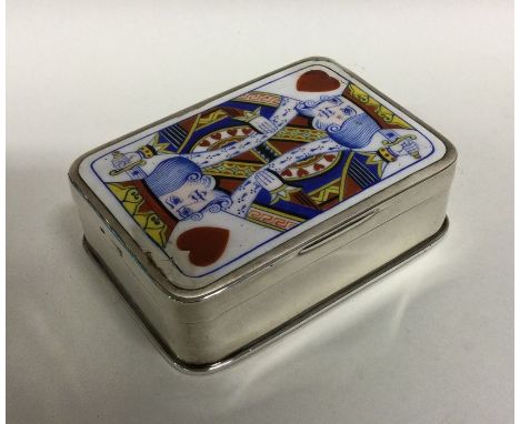 An unusual Edwardian silver and enamelled playing card box depicting the King of Hearts with hinged lid to gilt interior. Lon