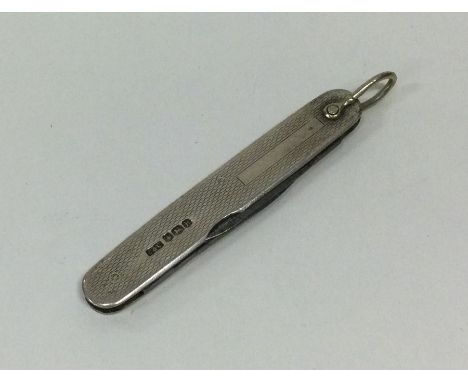 A small silver engine turned fruit knife. Sheffield. Approx. 15 grams. Est. £10 - £20.