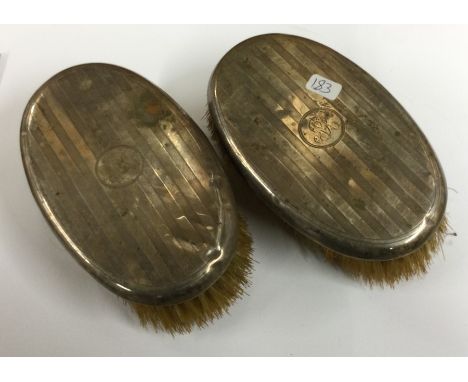 A pair of engine turned silver brushes. Birmingham. Est. £10 - £20.