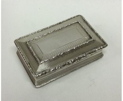 A heavy rectangular silver snuff box with hinged top to gilt interior. Birmingham 1836. By Francis Clark. Approx. 75 grams. E