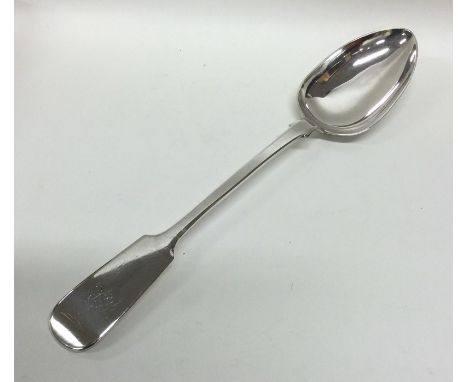 NEWCASTLE: A large fiddle pattern silver basting spoon. 1870. By Thomas Sewell. Approx. 142 grams. Est. £120 - £150.