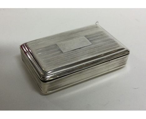 A good George III silver snuff box with reeded body. Birmingham 1824. By Thomas Spicer. Approx. 97 grams. Est. £200 - £300.