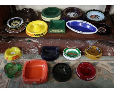 Shelf of pub advertising ashtrays