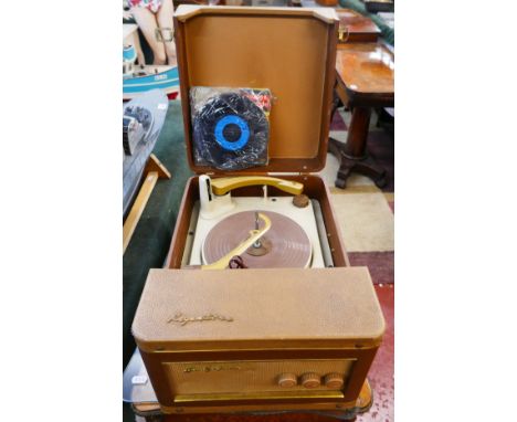 1960's Regentone portable record player with selection of 45rpm records