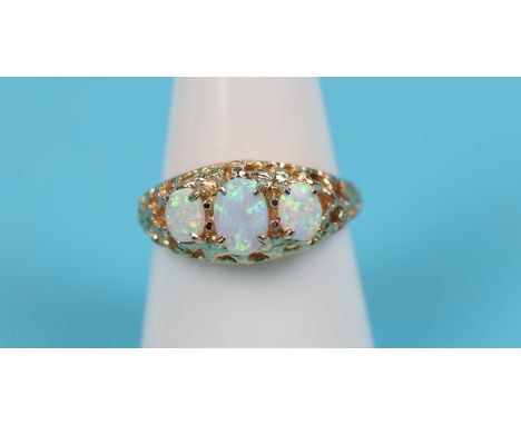 Gold opal 3 stone ring