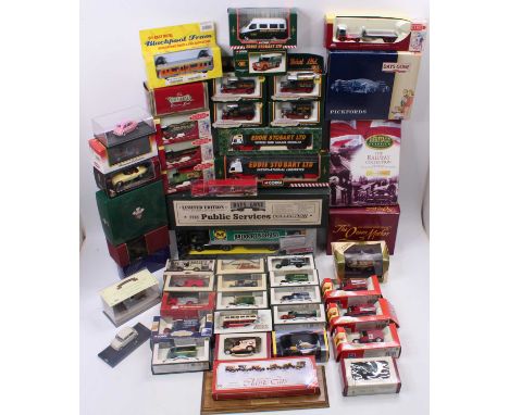 A large quantity containing a mixed lot of modern release diecast to include Corgi Toys, Lledo Days Gone, Victoria and others