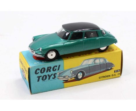 A Corgi Toys No. 210 Citroen DS19 comprising metallic dark green body, with black roof and spun hubs, in the original blue an