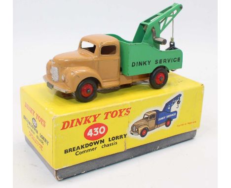 A Dinky Toys No. 430 breakdown lorry comprising of tan cab and chassis with green back and red hubs housed in the original li