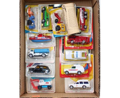 A group of 12 Corgi juniors carded mostly still sealed apart from 43 Massey Ferguson Tractor Shovel which has been opened.