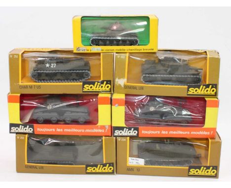 Seven various boxed Solido military diecast vehicles all housed in original window boxes, some boxes split and away from oute
