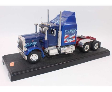 A Revell 1:24th scale Peterbilt 359 truck on plinth with "Classic" livery, appears complete.