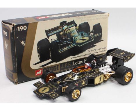 A Corgi Toys No. 190 JPS Lotus F1 race car, 1/18 scale comprising of black and gold body housed in the original box with pack