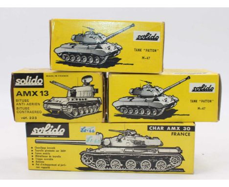 A Solido boxed military vehicle diecast group, four examples to include No. 202 M-47 Patton battle tank, No. 223 AMX 13 tank,