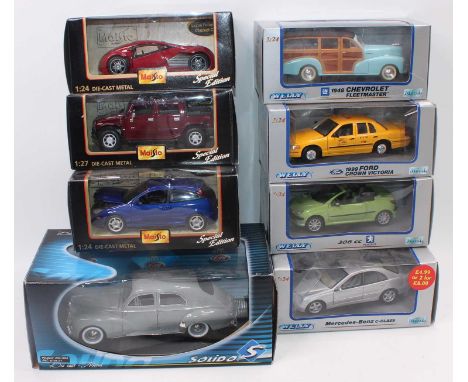 Eight various boxed 1/24 and 1/18 scale boxed diecast by Solido, Maisto, Welly and others, to include a Solido Peugeot 203, a