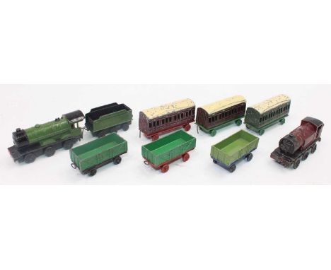 A collection of Dinky Toys pre-war locomotives and rolling stock to include a No. 18 goods train gift set comprising of 0-6-0