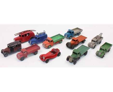 A small group of 11 play-worn original 25 series Dinky commercial trucks and others mainly pre-war with crimped axels as foll