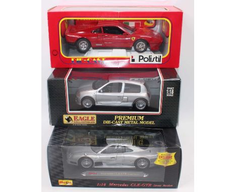 A 1/18 scale boxed  diecast vehicle group, three examples to include a Polistil Gold Series Ferrari GTO, a Maisto 1/18 scale 