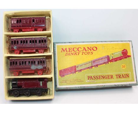 A Dinky Toys pre-war No. 20 passenger train gift set comprising of tank locomotive, with two coaches and one guards van, all 