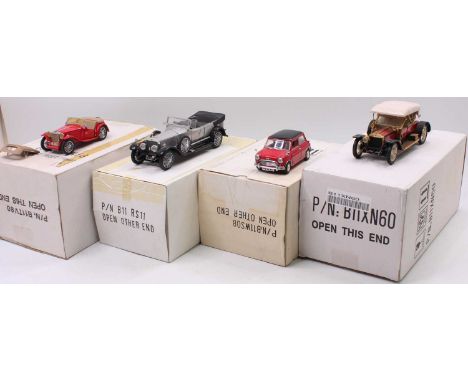 A group of 4 Franklin mint boxed models in approx 1:24th scale as follows: 1910 Rolls Royce Silver Ghost, 1925 Rolls Royce Si