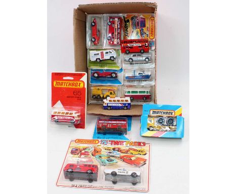 A group of 14 mainly carded Matchbox 1-75 Series models which includes TP2 twin pack with a fire engine and a police car with