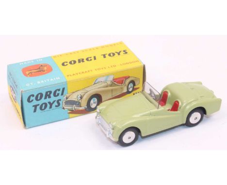 Corgi Toys No.305 Triumph TR3 Sports Car in metallic olive green body, red seats, silver trim, and flat spun hubs in mint con