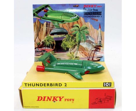 Dinky Toys No.101 Thunderbird 2, comprising of green body with four yellow plastic legs and red rear boosters, complete with 