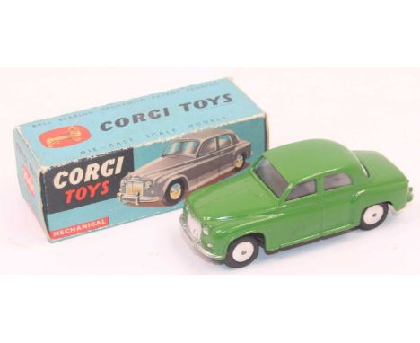 A Corgi Toys No. 204m Rover 90 saloon in green with flat spun hubs, with working mechanical mechanism in near mint to mint co