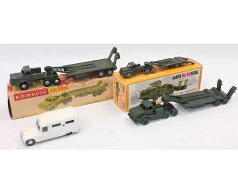 Military and Emergency Services diecast group, 4 examples to include Politoys Tank Transporter, Kemlow Tank Transporter, Budg