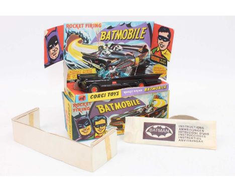 A Corgi Toys 1st issue 267 Batmobile without toe hook in gloss black body 'Bat' logo on doors, with gold cast hubs with red '