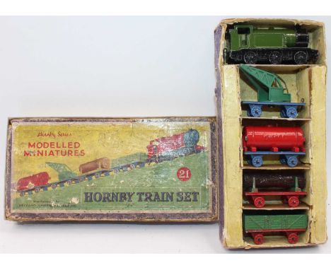 A Dinky Toys pre-war No. 21 goods train gift set comprising of tank locomotive, crane wagon, tank wagon, lumber wagon, and op