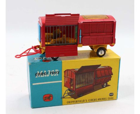 Corgi Toys No. 1123 Chipperfields Circus animal cage truck comprising of red and blue body with yellow chassis and plastic re