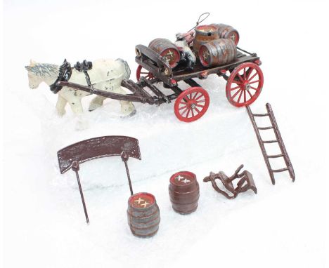 A Taylor &amp; Barrett horse-drawn brewers bray, comprising of brown wagon with various beer barrel load, rear ladder and rep