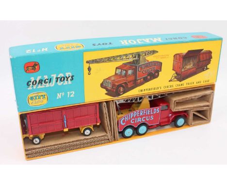 Corgi Toys, gift set 12, Chipperfields Circus crane truck and cage, comprising of 1121 crane truck, red body with light blue 