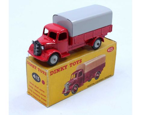 Dinky Toys, 413, Austin Covered Wagon, red cab and back, with grey hubs and grey tinplate tilt, in the original all card corr