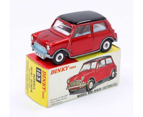 Dinky Toys No. 183 Morris Mini Minor comprising metallic red body with gloss black roof and white interior, in the original a