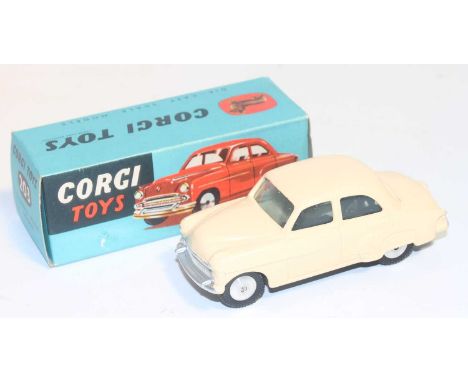 A Corgi Toys No. 203 Vauxhall Velox in cream colour with spun hubs, near mint to mint condition, comes with early issue blue 