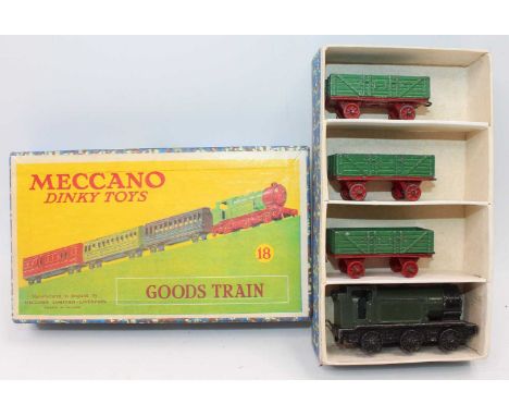 A Dinky Toys No. 18 goods train gift set, comprising of 0-6-0 tank locomotive with three various goods wagons, all housed in 