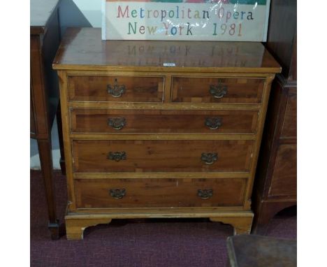 An early 20th century yew wood chest of two chest over three long drawers raised on bracket feet, H. 76 W. 76 D. 42cm 