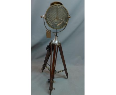 An industrial style tripod spot lamp 