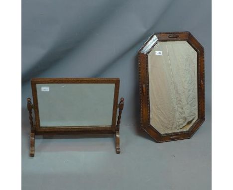 An octagonal oak framed wall mirror, having bevelled glass plate within beaded border, H. 67cm W. 43cm, together with an oak 