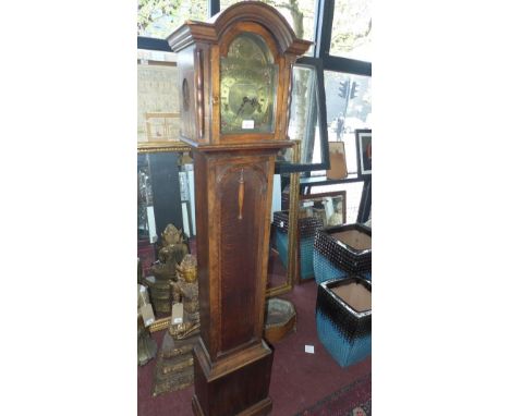 A 1920's oak grandmother clock, the dial signed Tempus Fugit 