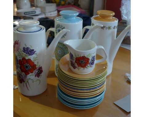 Three J & G Meakin hot water pots, with jug and saucers 
