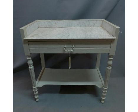 A grey marble topped basin table, H. 81 W. 74 D. 42cm 