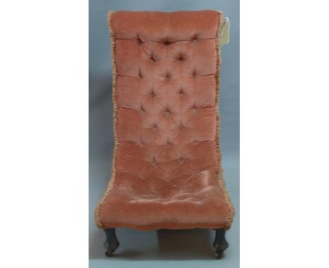 A late 19th/ early 20th century button back nursing chair 