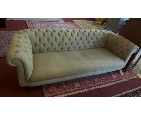 A grey three seater chesterfield sofa, L. 200 H. 65 D. 85cm 