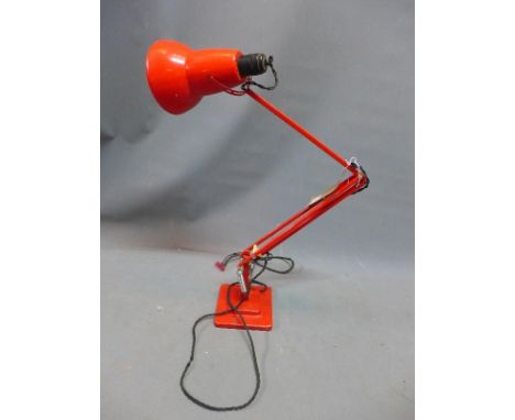 A red Herbert Terry anglepoise lamp, stamped 